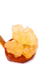Yellow Rock Sugar Chunks from Yunnan China in Wooden Spoon Traditional Cane Sugar Crystals