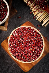 Fresh Red Kidney Beans in Wicker Basket on Wooden Board - Healthy Legumes and Farm Grains