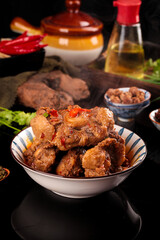 Spicy Braised Oxtail Stew with Fresh Peppers and Traditional Cooking Ingredients
