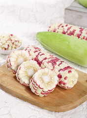 Sweet Glutinous Corn Cobs from Yunnan - Colorful Red White Kernels on Wooden Board