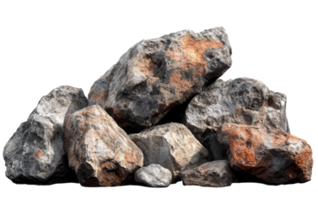 Collection of various stone boulders showcasing natural textures and colors in a mountainous terrain at low resolution