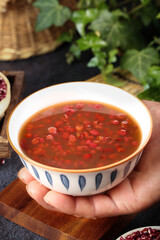 Traditional Guizhou Red Bean Soup with Mixed Grains - Chinese Farmers Cuisine in Ceramic Bowl