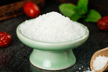 White Sugar in Green Ceramic Bowl with Fresh Strawberries and Herbs for Cooking and Baking