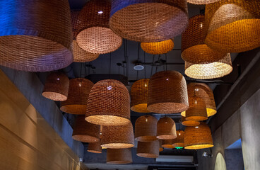 cowboy hats on a wooden shelf