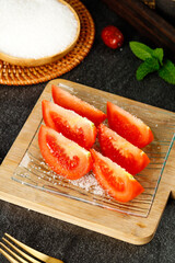 Fresh Tomato Slices with White Sugar on Wooden Board - Healthy Food Preparation