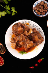 Braised Beef Oxtail Stew with Fresh Herbs and Spices Traditional Comfort Food Dish