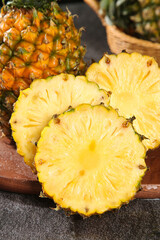 Sweet Zhanjiang Xuwen Pineapple Slices - Fresh Tropical Fruit with Crisp Meat Texture on Wooden...