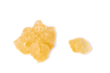 Raw Yellow Cane Sugar Rock Candy Crystals Isolated on White Background