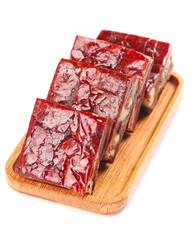 Delicious Vegetarian Date Walnut Pie Squares with Berry Topping on Wooden Board