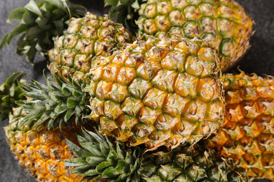 Fresh Ripe Pineapples at Zhanjiang Market with Green Crowns and Golden Flesh
