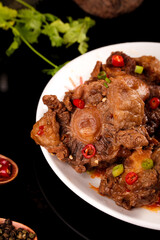 Spicy Braised Beef Tailbone with Chili Peppers - Traditional Asian Comfort Food Dish