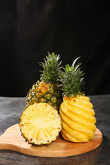 Fresh Pineapple Slices on Wooden Cutting Board - Tropical Fruit Preparation