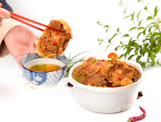 Spicy Asian Oxtail Beef Bone Stew with Chopsticks - Traditional Braised Meat Dish