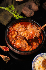 Spicy Oxtail Stew in Clay Pot with Rice - Traditional Homemade Comfort Food Recipe