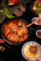 Spicy Oxtail Stew with Vegetables in Traditional Pot - Asian Comfort Food