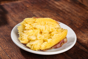 Fresh Roasted Sweet Potatoes from Shaanxi China Ready to Eat on Wooden Table