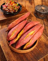 Fresh Roasted Sweet Potatoes from Shaanxi China on Rustic Wooden Table