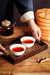 Traditional Chinese Tea Ceremony with Handmade Bamboo Steamer and Puerh Tea Cups