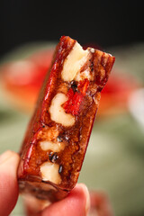 Xinjiang Walnut Date Pie Slice with Red Fruit Traditional Chinese Dessert Food Photography