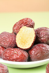 Premium Ruoqiang Jujubes from Xinjiang China with One Cut Open Showing Golden Interior