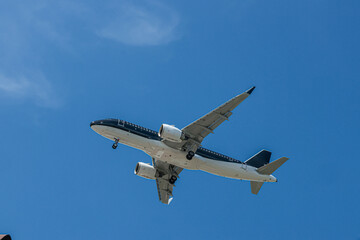 Jetliner Landing Amid Brilliant Summer Sunshine