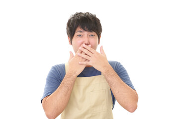 エプロン姿の男性