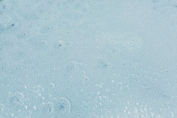 White frozen landscape with icy pond