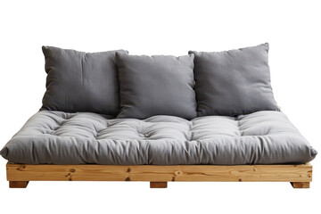 Obraz premium Futon with three cushions designed for comfort, showcasing simple wooden structure and soft gray fabric ideal for modern living spaces