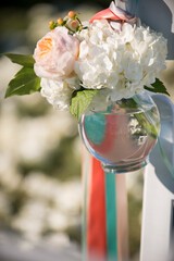 Pink Rose and White Hydrangea in Vase with Wedding Chair Ribbons
