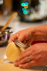 Cutting circles of dough for individual pot pie crusts