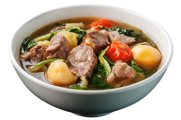 Pork Sinigang prepared with fresh vegetables and savory broth in a bowl ready to be served at a family gathering in the Philippines during a warm afternoon