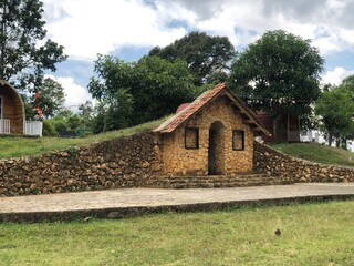 Stone House in a Green Landscape at the Puncak Ratu tourist location, Pamekasan, East Java, Indonesia