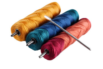 Brightly colored sewing threads and needle showcase vibrant crafting essentials for creative projects and textile design in a clean workspace setting