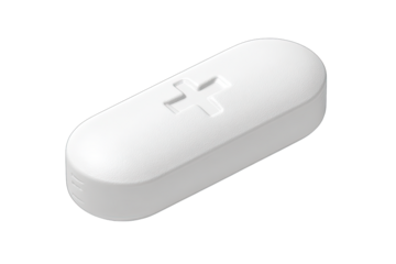White pill with embossed cross symbol, isolated on white background