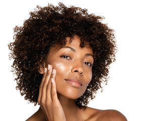 Attractive african american woman applying hydrating cream on her face skincare routine for glowing complexion and rejuvenation healthy natural beauty concept for youthful skin