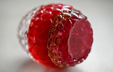 High resolution close up color image of a single red and clear color dragon's egg made up of epoxy...