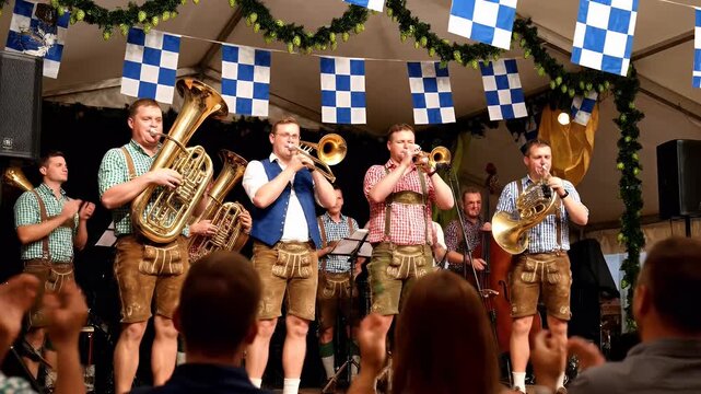 Musicians Playing Brass Instruments at Festive Bavarian Event