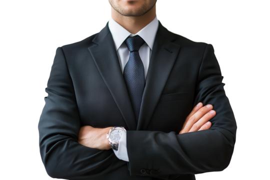 Business professional in a formal suit with arms crossed, displaying confidence and authority in a neutral setting