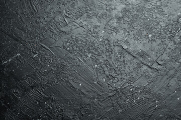 Black stone texture concrete background. Textured stone surface. Top view. Free space for text.