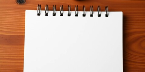 A single, squared sheet of paper neatly placed within a notepad, grid, square