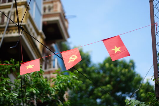 Hanging Vietnamese national flag displayed to celebrate the 80th anniversary of Vietnam National Day, September 2, 2025, marking the historic milestone with the A80 military parade in Hanoi. 