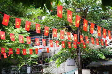 Hanging Vietnamese national flag displayed to celebrate the 80th anniversary of Vietnam National...