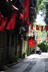 Hanging Vietnamese national flag displayed to celebrate the 80th anniversary of Vietnam National Day, September 2, 2025, marking the historic milestone with the A80 military parade in Hanoi. 