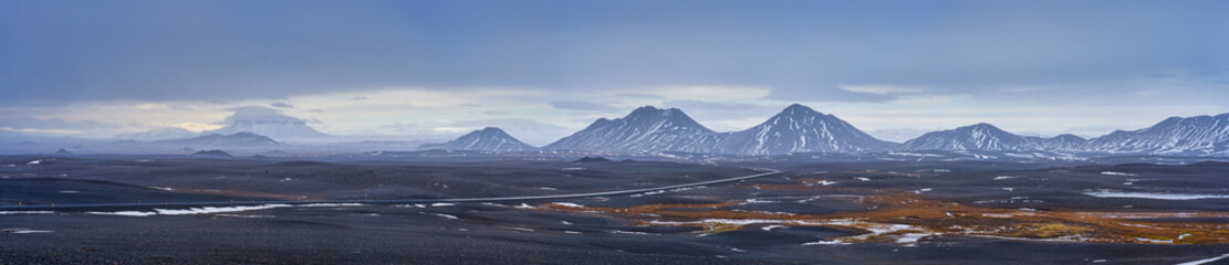 panoramic view of the mountains of Iceland while travel by driving a car , Road trip travel in road no.1 in Iceland.