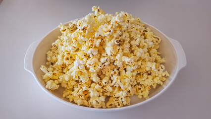 Bowl of Fresh Popcorn on Table