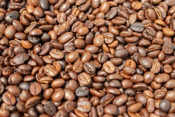 Fototapeta premium Fresh premium roasted brown Arabica coffee beans background