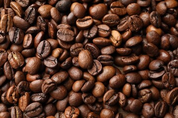 Aromatic coffee beans as background, top view
