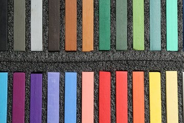 Colorful chalk pastels in box, top view