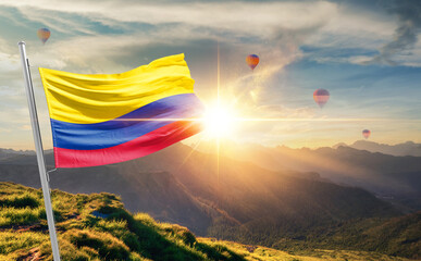 Colombia flag waving in beautiful scenery. Colombia national flag for independence day.