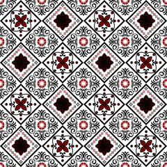 Elegant vintage black and red floral seamless pattern with intricate damask ornament for textile or wallpaper design